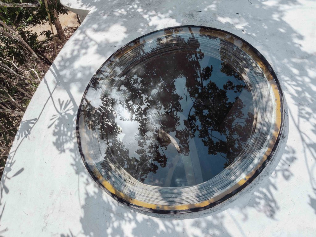 Parque Nek Ha, circular villas, luxury architecture, glass window on top of the building